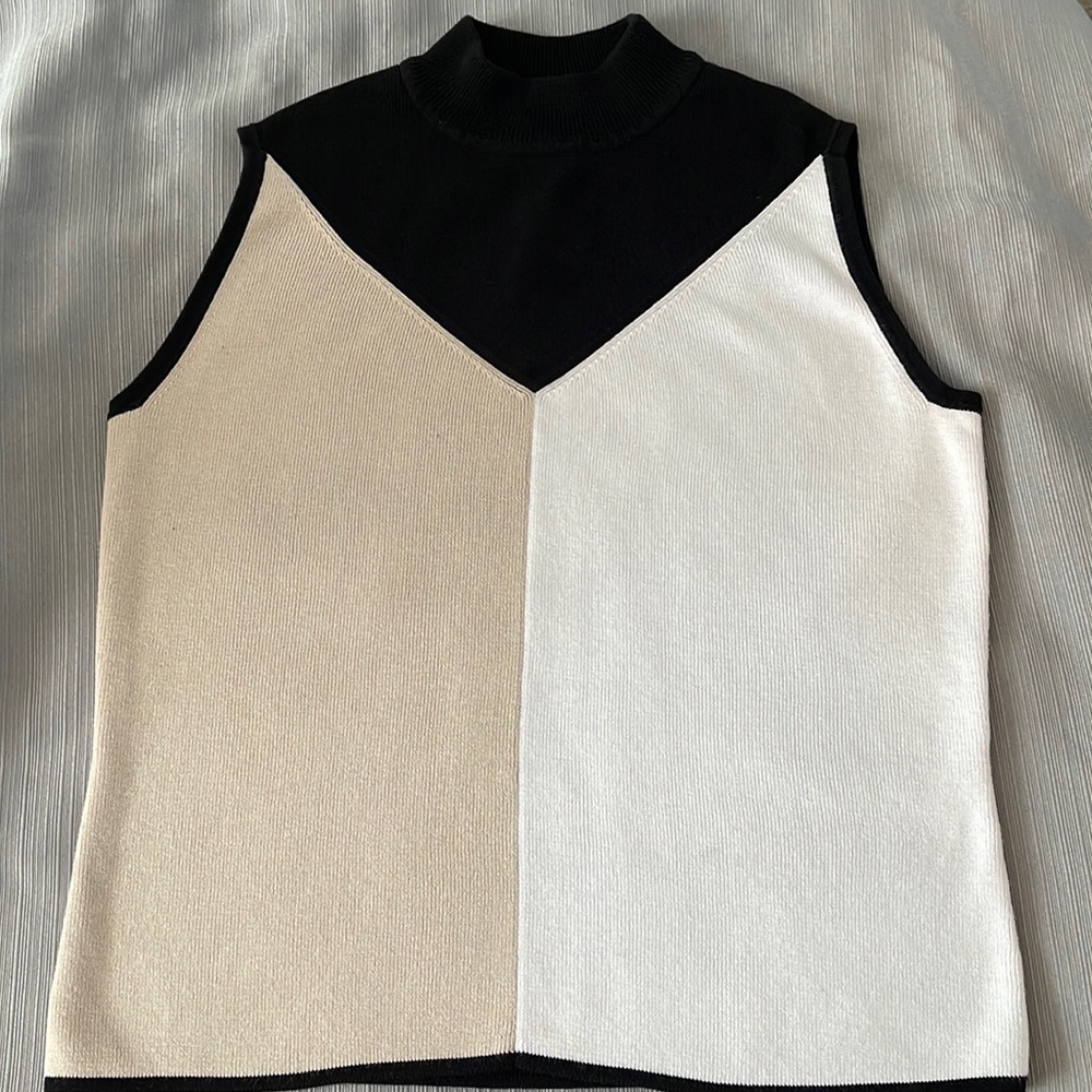Designers Originals sweater size medium. Sweater turtleneck and sleeveless .